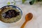 Bubur kacang hijau ketan hitam, Indonesian sweet dessert made from mung beansÂ porridgeÂ topping with black sticky rice